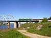 Электровоз ВЛ10 с грузовым поездом на мосту через Волхов