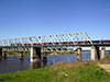 Электровоз ВЛ10 с грузовым поездом на мосту через Волхов
