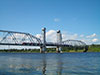Электропоезд на Кузьминском мосту через Неву
