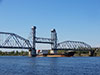 Теплоход "Сургут" под разведённым Кузьминским мостом через Неву