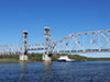 Теплоход "Топаз Руза" у разведённого Кузьминского моста через Неву