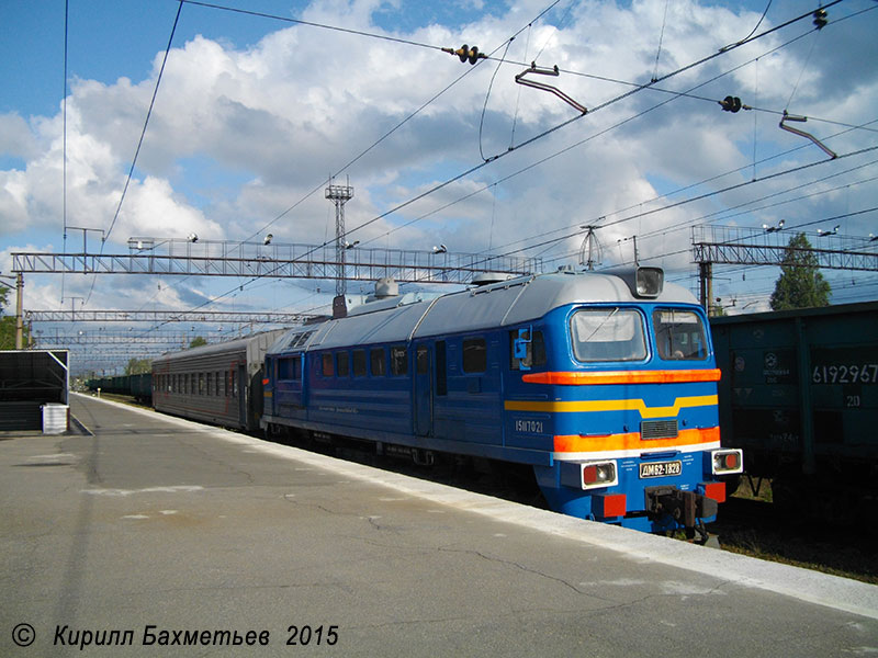 Тепловоз ДМ62-1828 с рабочим поездом